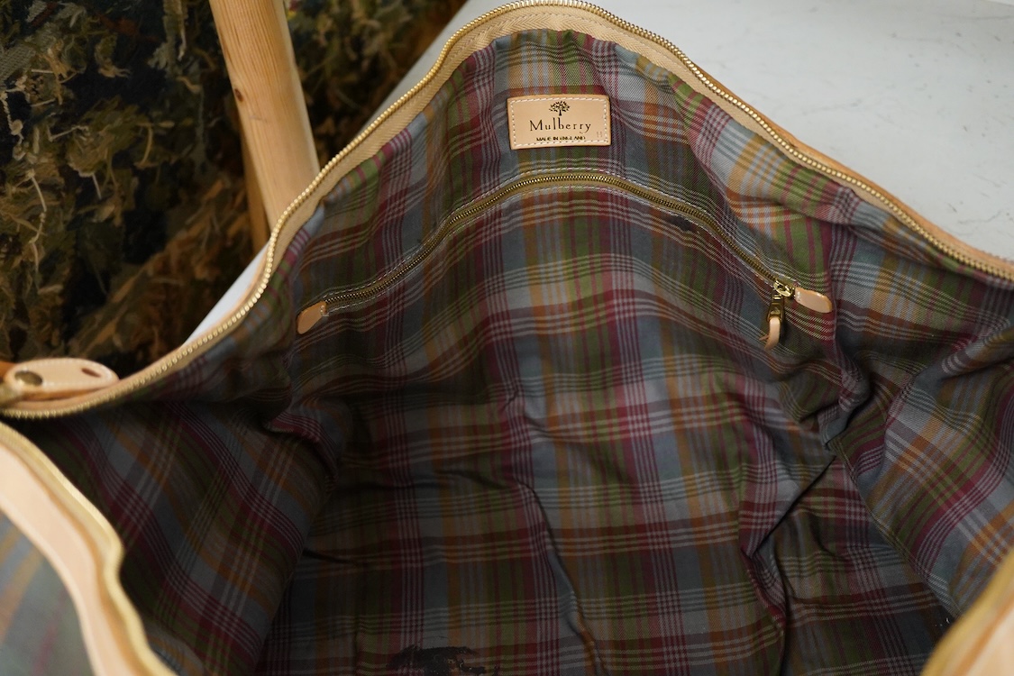 A Mulberry tartan canvas golf case, holdall and umbrella